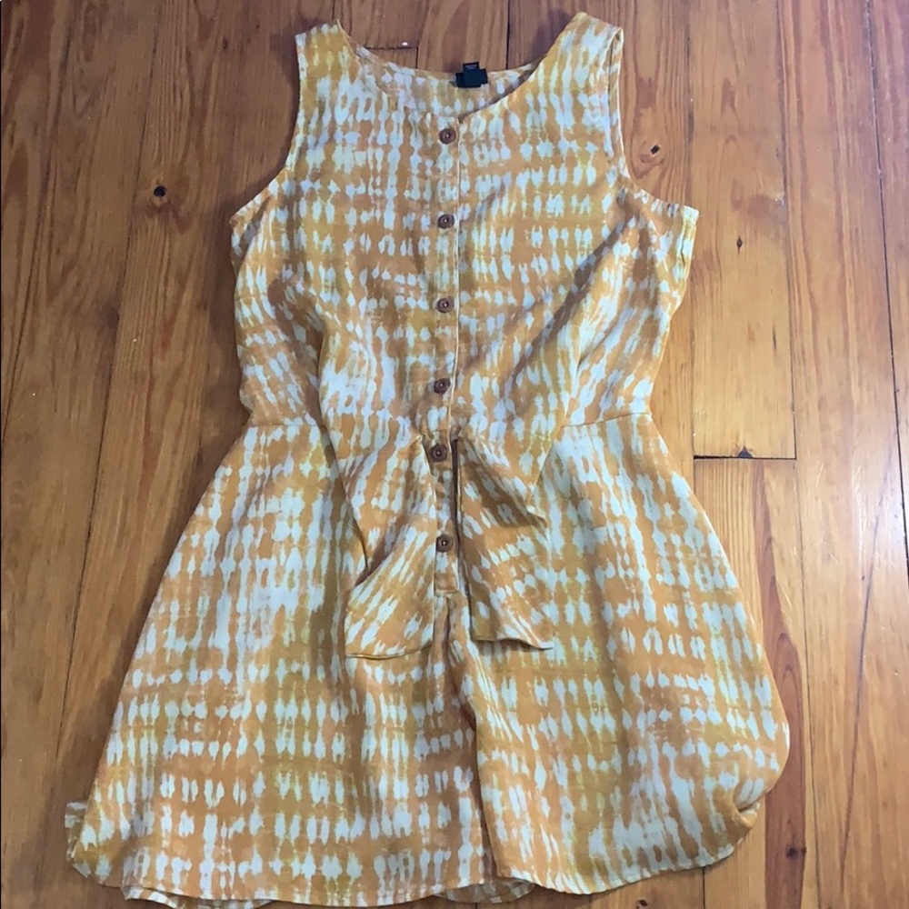 Yellow and white sleeveless romper